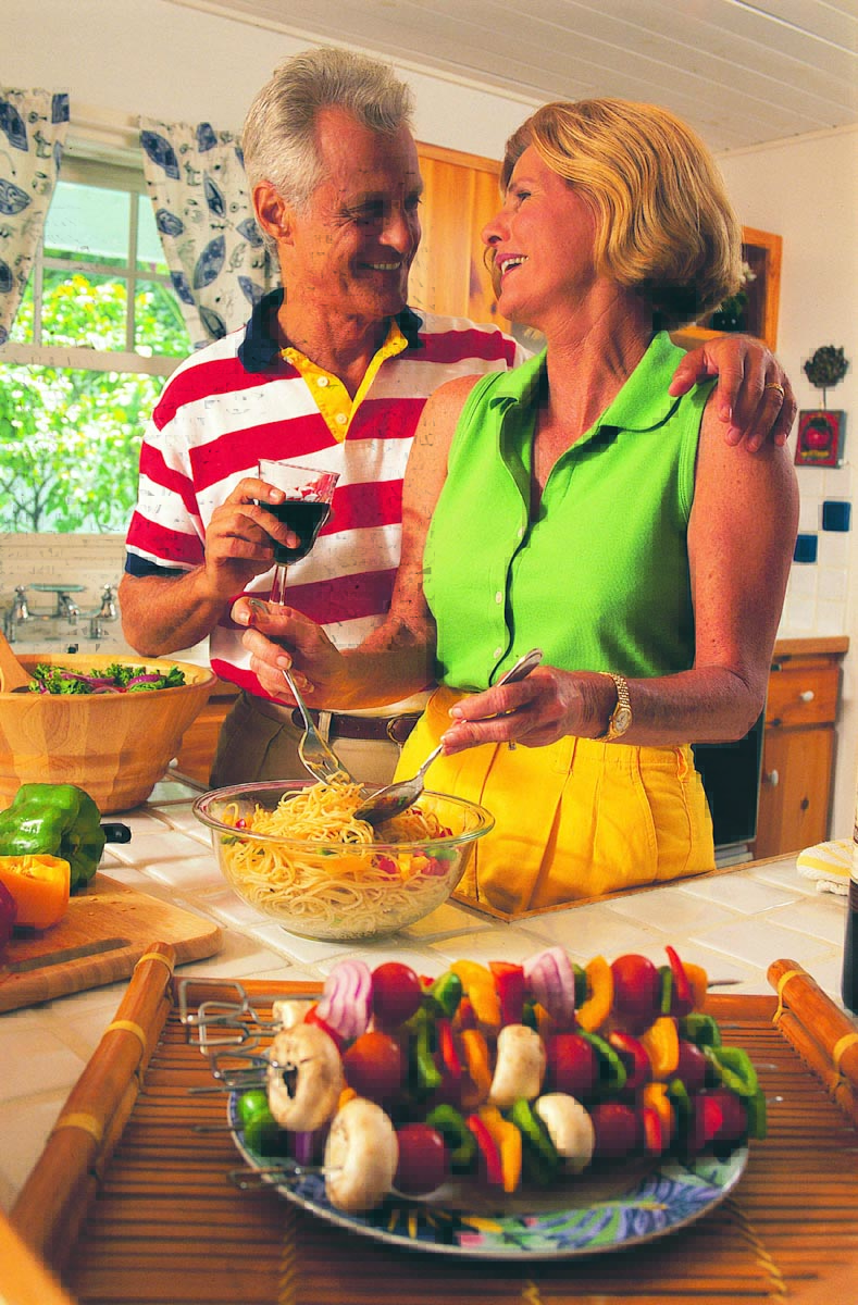The Booming Baby Boomers - couple in kitchen