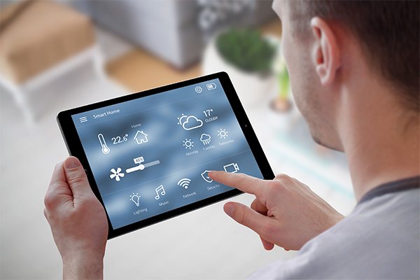 Behind the Walls in Today’s Smart Homes - smart home control on tablet